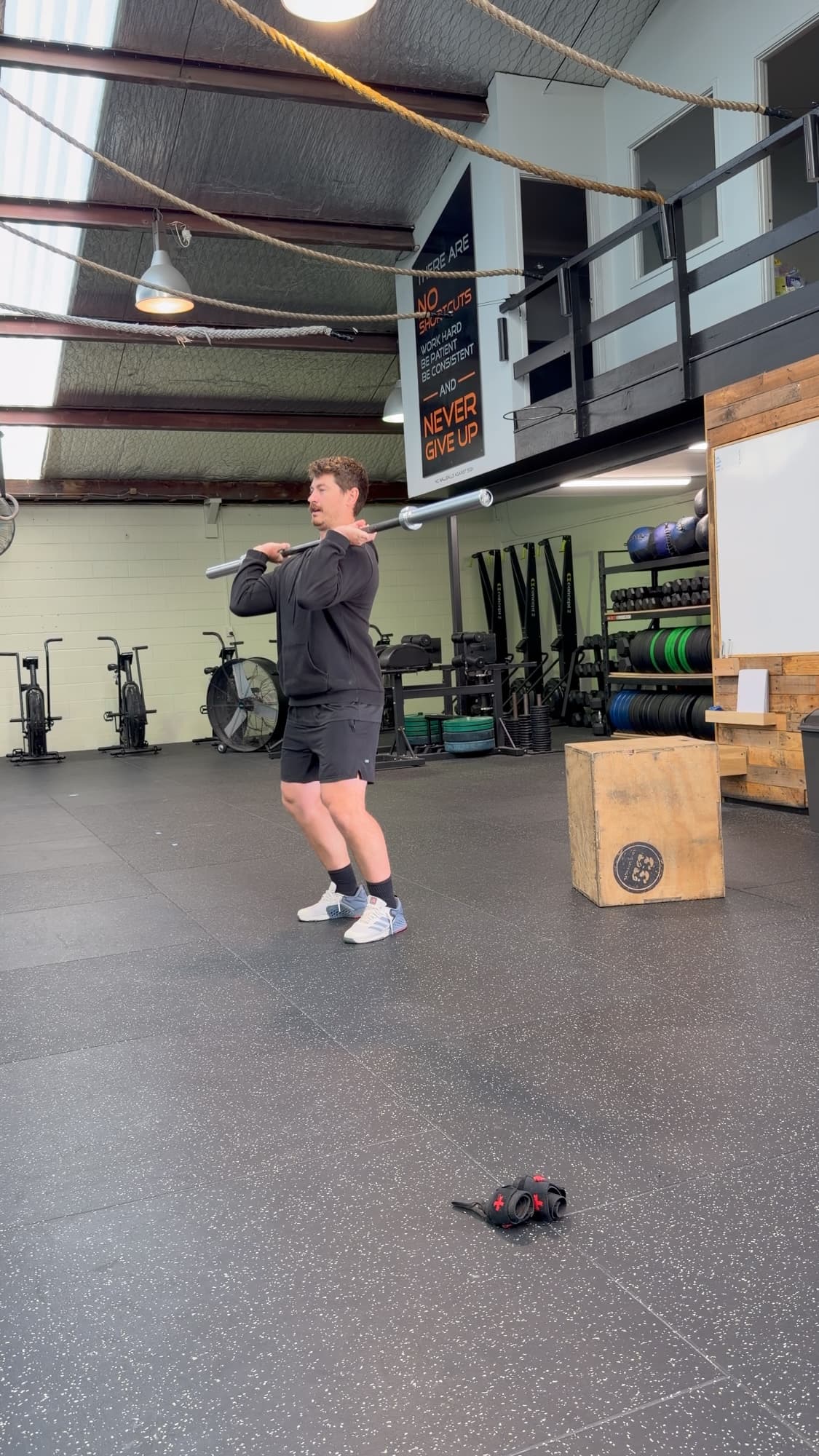 A member front squatting a barbell at CrossFit Hibiscus Coast