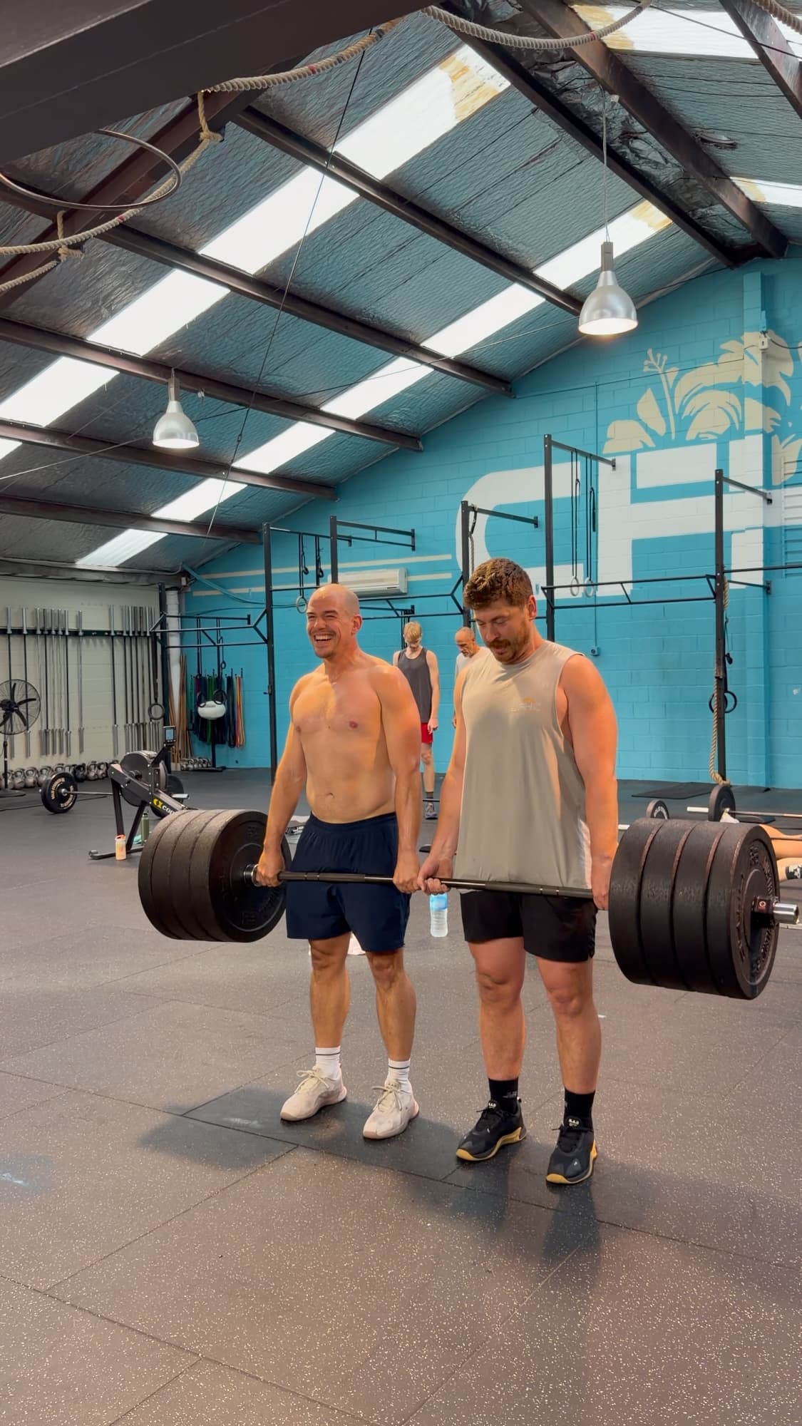 A pair of athletes doing a paired deadlift at CrossFit Hibiscus Coast